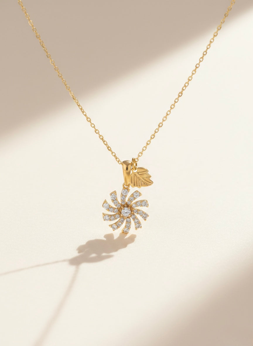 Luxury Gold Sunburst Crystal Pendant Necklace – Leaf Charm Design