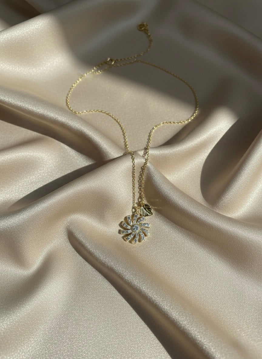 Luxury Gold Sunburst Crystal Pendant Necklace – Leaf Charm Design