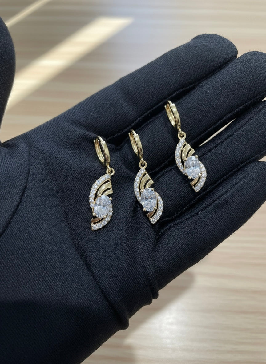 Elegant Gold Crystal Twist Pendant & Earrings Set – Luxury Shine